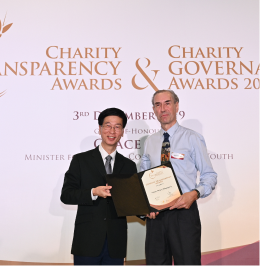 Charity Transparency Award 2019 Morten Strange and Commissioner of Charities Dr Ang Hak Seng
