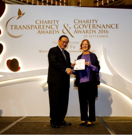 Margie Hall receiving the Charity Transparency Award 2016